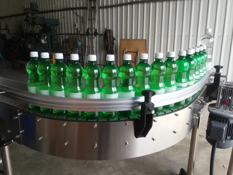 EDELSTEIN PET water bottles moving through a conveyor line