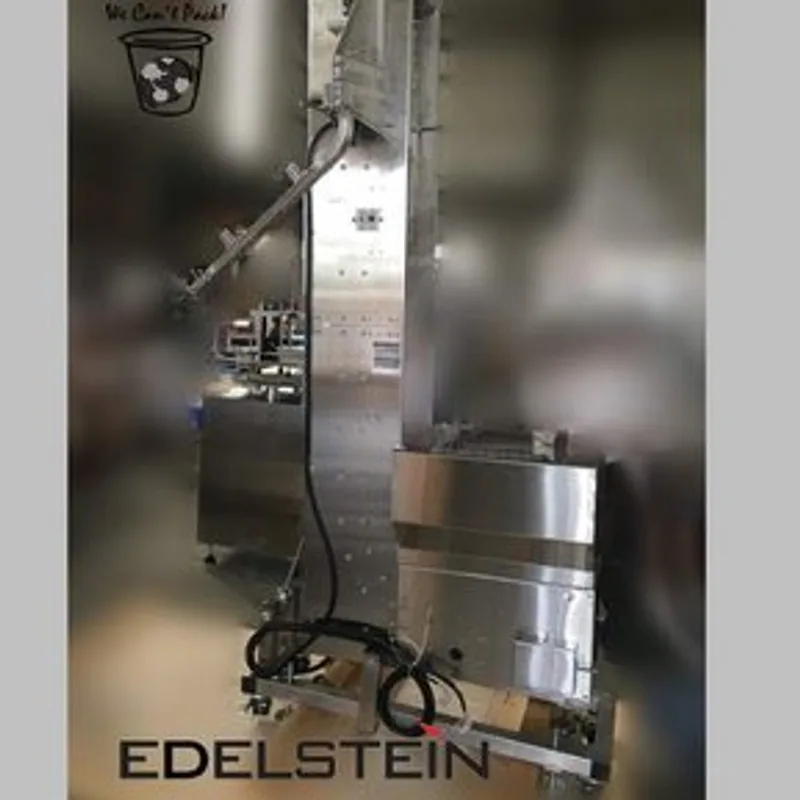 EDELSTEIN lifting-type cap sorter elevator feeding caps to the capper