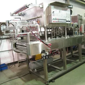 EDELSTEIN multi-lane cup filling and sealing line in production