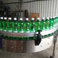 EDELSTEIN bottles moving through conveyor